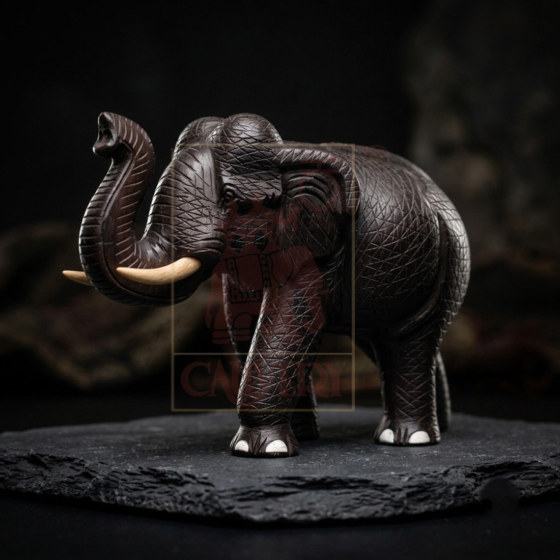 Rosewood Skin Carved Salute Elephant 8"